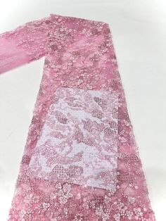 This high quality Fabric is measured in 5 Yards With Embroidered Beading and Sequin. It is soft, very delicate and beautiful. This high Quality Fabric is made with Fashion embroidered rhinestones can be used in making party wedding dresses, skirts, shawls, scarves and other other fashion apparels as you would like. Size : Length : 5 yards (180 inch). Width: 50 inch (Please allow slight deviation for the measurement data ,±1 inch) Material: 100% Polyester, Tulle Lace Fabric, Eco-Friendly embroidery Elegant Pink Sequin Fabric With Floral Embroidery, Elegant Pink Fabric With 3d Embroidery, Elegant Pink Lace For Summer, Elegant Pink Lace For Party, Elegant Embroidered Sequin Fabric For Spring, Spring Embellished Embroidered Fabric, Spring Embellished Embroidered Fitted Fabric, Elegant Pink Sequin Fabric For Summer, Elegant Embroidered Pink Lace