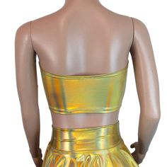 Stretch gold opal holographic tube top. This tube top is sewn to fit your curves and not flatten you out, while fitting snug enough to stay up :) Glamorous Bandeau Crop Top For Club, Stretch Bandeau Tube Top For Club, Gold Stretch Crop Top For Party, Gold Sleeveless Stretch Crop Top, Strapless Stretch Crop Top For Club, Gold Stretch Sleeveless Crop Top, Stretch Strapless Crop Top For Club, Stretch Crop Top Tube Top For Party, Glamorous Stretch Tube Top For Club