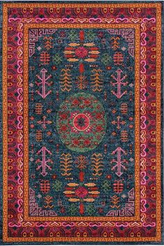 a blue rug with an ornate design on the center and red, pink, green, orange