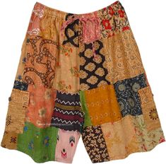 a multicolored patchwork shorts is displayed on a white background