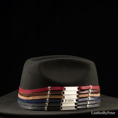 Personalized Leather Hat Band for a Unique Touch Enhance your cowboy or fedora hat with our exquisite Personalized Leather Hat Bands for men. Crafted with care and attention to detail, this hat band is the perfect accessory to add a touch of personalization and style to your favorite headwear. Cool western hat band. Key Features: Premium Leather Strand: Our leather hat band features a high-quality leather strand that not only complements your hat but also adds a touch of sophistication to your l Custom Adjustable Fedora For Formal Occasions, Adjustable Fedora For Formal Occasions, Modern Fedora With Adjustable Fit And Short Brim, Modern Adjustable Fedora With Short Brim, Modern Felt Hat With Adjustable Flat Crown, Modern Adjustable Felt Hat With Flat Crown, Modern Felt Hat With Short Brim, Modern Adjustable Felt Hat With Short Brim, Adjustable Wide Brim Top Hat As Gift