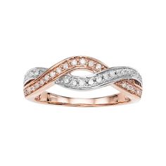 Adorned with diamond-accented rows, this two-tone crisscross ring displays your sophisticated sense of style.RING DETAILSWidth: 7 mmMetal: pink rhodium-plated 10k rose gold, white rhodium-plated 10k rose goldDIAMOND DETAILSTotal weight: 1/4 ct.Shape: roundColor grade: H-IClarity: I1-I2Setting: prongImage(s) may be enlarged to show detail.Diamond weights are approximate. Diamond total weights may vary between .01 and .08 ct. Some diamonds have fewer than 17 facets.Gemstones may have been treated Crisscross Ring, Ring Displays, Right Hand Rings, Rose Gold White, Rose Gold Diamonds, Womens Jewelry Rings, Rose Gold Ring, Rhodium Plated, Criss Cross