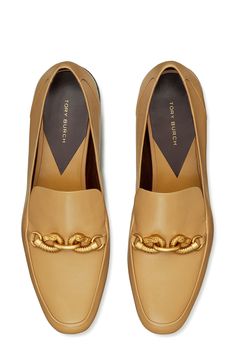 A dual dragon–headed ornament tethered to the top adds an opulent touch to a classically refined loafer crafted of lightly crackled leather. 3/4" heel ( size 7.5) Leather upper, lining and sole Imported Gold Formal Loafers With Branded Insole, Classic Gold Leather Loafers, Classic Gold Loafers For Formal Occasions, Classic Gold Loafers For Work, Elegant Formal Loafers With Textured Leather, Elegant Textured Leather Loafers For Formal Occasions, Elegant Textured Leather Loafers, Designer Gold Loafers For Work, Elegant Formal Textured Leather Loafers