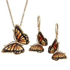 Baltic Amber Butterfly Collection | Timepieces International Luxury Sterling Silver Butterfly Necklace, Fine Jewelry Butterfly-shaped Yellow Gold Jewelry, Fine Jewelry Yellow Gold Butterfly, Luxury Butterfly Charm Pendant Jewelry, Luxury Jewelry With Butterfly Charm Pendant, Luxury Jewelry Pendant With Butterfly Charm, Luxury Pendant Jewelry With Butterfly Charm, Yellow Gold Pendant Jewelry With Butterfly Clasp, Formal Jewelry With Butterfly Clasp