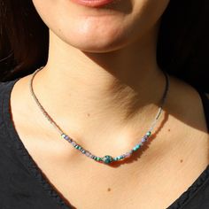 Cool, unique necklace, that will update any outfit! Made with genuine Turquoise and Tanzanite. Delicate and lightweight, perfect for everyday wear! One size fits all. Made in the USA. Ships in 0-3 business days. Turquoise is associated with the Throat chakra and it represents knowledge and divine guidance. It is also an aide in communication, in synchronizing what we mean to say with what is actually said. Tanzanite is a very rare, and powerful crystal that can stimulate your Crown, Third Eye an Tanzanite Necklace, Divine Guidance, Power Crystals, Unique Necklace, Throat Chakra, Genuine Turquoise, Unique Necklaces, Third Eye, Very Rare