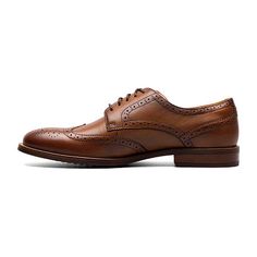 Classic yet contemporary, the Florsheim Rucci Wingtip Oxford features a classic wingtip design with a sleeker, more modern silhouette. The versatile design can be worn with everything from your best suit to your favorite jeans.Features: ComfortClosure Type: Slip-OnShoe Heel Height: 1/2 InchUpper/Outer Base Material: 100% LeatherShoe Lining Material: SyntheticSole Material Content: 100% RubberToe Type: Wing Tip, Closed ToeCare: Wipe CleanHeel Style: Flat HeelCountry of Origin: Imported Masculine Wingtip Lace-up Business Shoes, Modern Wingtip Lace-up Shoes, Modern Wingtip Lace-up Shoes With Rubber Sole, Modern Formal Lace-up Shoes With Brogue Detailing, Masculine Business Casual Leather Wingtip Shoes, Wingtip Oxfords With Textured Sole, Masculine Leather Wingtip Shoes With Textured Sole, Modern Brogue Leather Shoes For Business Casual, Masculine Semi-formal Wingtip Dress Shoes