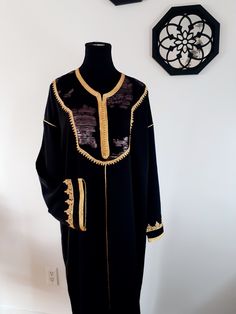 Premium quality handmade black crepe silk crepe Moroccan kaftan. This caftan is ideal for family occasions such as family celebrations, the month of Ramadan, Aid, or weddings. Several sizes available. It is also possible to personalize your caftan according to your taste, contact us for more information. Top quality black caftan, handy made. This caftan is ideal for family occasions such as family celebrations, the month of Ramadan, aid, or weddings. Several sizes available, it is possible to ha Black Long Sleeve Agbada For Eid, Long Sleeve Black Agbada For Eid, Traditional Black Agbada For Ceremonies, Elegant Black Agbada For Eid, Traditional Black Agbada With Dabka, Traditional Black Agbada With Dabka Detailing, Black Tunic Abaya For Eid, Elegant Black Tunic Abaya, Elegant Black Tunic Thobe