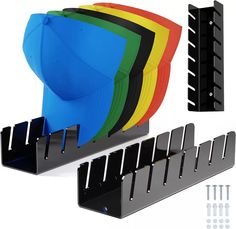 a set of four black plastic storage racks with six different colored plates on each rack