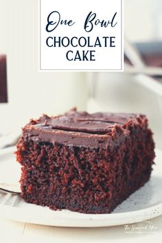 a close up of a piece of cake on a plate with the words, one pound chocolate cake