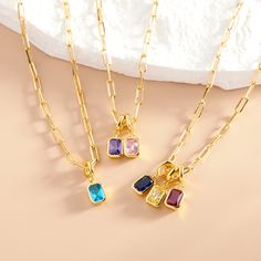 Adorn yourself in the timeless elegance of the Mackenzie Birthstone Necklace. Crafted from the finest materials, this stunning necklace showcases your birthstone and is sure to spark conversations. Are you ready to make a statement with your unique style? Available in 14k gold plated and rhodium plated brass and birthstone charm 14k gold plated sterling silver or rhodium plated sterling silver 1/8"x1/4" birthstone Cubic Zirconia charm 18" paperclip chain with 2" extender Lobster claw closure NOT College Girl Gifts, Timeless Necklace, Birthstone Charm Necklace, Girlfriend Jewelry, Modern Jewellery Design, Trendy Necklace, Buy Necklace, Trendy Necklaces, Birthstone Charms