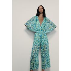 V-Neck Jumpsuit With White Short Sleeves. Elastic Waist. Interior Lining. Wide Leg. Back Opening With Button Closure. M9 Blue Summer Pantsuit For Party, Chic Green Overalls, Green V-neck Jumpsuit For Loungewear, Blue Pantsuit For Summer Party, Zara Green V-neck Jumpsuits And Rompers, Chic Blue V-neck Pantsuit, Spring Casual V-neck Pantsuit, Chic Green Summer Pantsuit, Casual V-neck Pantsuit For Spring