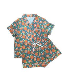 Orange you glad I didn't say banana. Get 100% of your daily requirement of vitamin Cute with these pajamas. Grab your mini a pair to match her mama.. Adorable citrus print on a teal blue back ground. These were made for story time, movie night, and are great for cuddling up! Better Together: buy in a bundle and save! Details: Button down top Drawstring satin tie short Front pocket top Pocket short Super soft and breathable 95% Cotton, 5% spandex Classic Pajamas, Mini A, Orange You Glad, Back Ground, Teal Background, Orange Print, Tie Shorts, Blue Back, Orange Crush