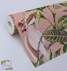 a wallpaper with a bird on it next to a roll of tape and some flowers