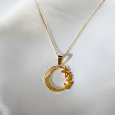 "DETAILS - Crafted with pure sterling silver and optional gold-plating OR pure solid gold - Chain style may vary slightly - Bail style may vary slightly - Pendant is approximately 3/4\" x 3/4\" - Made in New York VARIATIONS If you require any variation of this style (smaller or larger moon, longer chain, engraving, etc.) feel free to message us. We will do our best to accommodate you. Additional costs may apply depending on the variation. POLICY This item is made to order. Made to order items ar Butterfly Moon, Solid Gold Chains, Moon Necklace, Long Chain, Chain Styles, Gold Plating, Gold Chain, Gold Chains, Charm Necklace