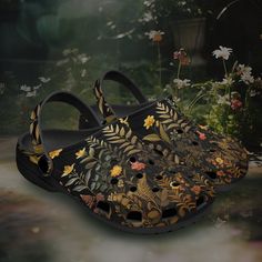 Cottagecore Floral Gardener Shoes Moody Dark Academia Clothing Goblincore Black Botanical Clogs Apothecary Herbs Plants Eclectic Maximalist Introducing our Dark Floral Crocs Style Clogs - where comfort meets style in perfect harmony. These uniquely designed clogs are a must-have addition to your footwear collection. With their elegant dark floral pattern, these clogs bring a touch of sophistication to your casual look. The rich, moody hues combined with delicate floral accents create a captivating contrast that's perfect for any season. Crafted with utmost care, these clogs offer superior comfort. The contoured footbed and lightweight, durable material make them ideal for all-day wear. Slip into these clogs, and experience the bliss of cushioned support with every step. These clogs are not Cadence Core, Apothecary Herbs, Moody Dark Academia, Dark Floral Pattern, Style Clogs, Dark Academia Cottagecore, Academia Clothing, Herbs Plants, Dark Academia Clothing