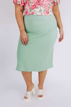 This PLUS SIZE Moth To A Flame Skirt features a trendy sage hue, textured detailing, and an elasticized high waist for added comfort. Lightweight and semi-stretchy, it's perfectly styled for the new season with a midi length and unlined, non-sheer design. A cute, girlish must-have! Details Textured fabric Elastic waistband Semi-stretchy Unlined Sizing Approximate measurements: SIZE LENGTH WAIST 1XL 35” 33” 2XL 36” 36” 3XL 37” 37” Fits true to size Fabric has stretch Model is 5’6” wearing 1XL Mat Spring Pencil Skirt For Loungewear, Moth To A Flame, Textured Fabric, New Season, Midi Length, Moth, Must Haves, High Waist, High Waisted