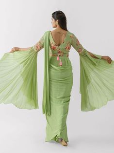 Green Pre-draped Saree With Mirror Work For Festivals, Pista Green Georgette Pre-draped Saree With Dupatta, Green Designer Choli With Traditional Drape, Designer Green Choli With Traditional Drape, Green Designer Wear Choli With Traditional Drape, Green Choli With Traditional Drape For Designer Wear, Green Pre-draped Saree With Resham Embroidery For Diwali, Fitted Green Pre-draped Saree With Mirror Work, Elegant Pista Green Pre-draped Saree For Festivals