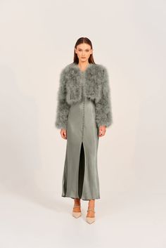 The perfect blend of strong shoulder structure and flattering feminine cropped length, the Marabou feather jacket oozes sophistication and style. Perfect for a chilly winter’s evening, the Manhattan can be dressed up or down no matter the occasion. 100% Marabou Feather outer Satin finish lining Hook and eye clasps at c Winter Feather Trim Outerwear For Night Out, Winter Outerwear With Feather Trim For Night Out, Long Sleeve Feathered Outerwear For Fall, Feather Trim Outerwear For Night Out In Winter, Winter Night Out Outerwear With Feather Trim, Long Sleeve Feather Outerwear For Fall, Elegant Faux Fur Outerwear For Night Out, Chic Long Sleeve Feathered Outerwear, Elegant Fitted Feathered Outerwear