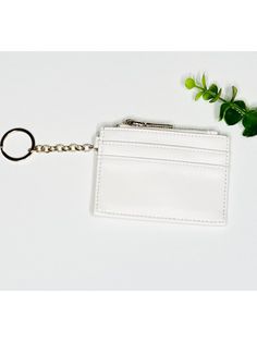 Details mini wallet cream 2 card pockets on each side 1 zipper pocket attached keychain 4.5" x 3.25" The Mini Montana Money Wallet– a fashionable and lightweight accessory that will be your BFF! If you are tired of lugging around bulky wallets that weigh you and your bags down, this wallet is for you. This featherlight wonder is designed to hold all your hard-earned cash in the zipper pocket, your credit cards and ID’s in the exterior card holders, and other small wallet necessities! With its co Money Wallet, Mini Wallet, Small Wallet, Card Holders, Credit Cards, You Bag, Montana, Zipper Pocket, Wallets