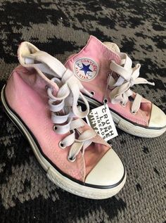 Vintage pink Converse All-Star high-tops. Kids size 10 1/2.    CL loves the idea of re-loving pieces that are unique, full of character, and STILL full of life. We are advocates of slow fashion and reducing our carbon footprint on our environment. Each piece is hand selected and CL approved! Trendy Pink High-top Sneakers For Spring, Spring Pink High-top Sneakers, Pink High-top Sneakers With Round Toe, Pink Casual High-top Sneakers With Round Toe, Cute High-top Sneakers, Pink High-top Sneakers, Pink Round Toe High-top Sneakers, Casual Pink Cotton Sneakers, Pink High-top Sneakers For Spring