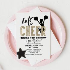 a cheer birthday party is set up on a pink plate