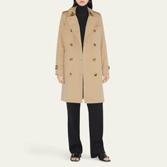 Burberry "Kensington" organic water-resistant gabardine trench coat featuring signature check lining and undercollar Trench collar with throat latch; double-breasted front Long sleeves; belted cuffs Chest gun flap; back rain shield Belted waist Shoulder epaulets Side flap pockets Straight fit Knee length Center-back vented hem Organic cotton Made in United Kingdom Classic Double-breasted Outerwear With Belted Cuffs, Classic Gabardine Belted Outerwear, Classic Pea Coat With Belted Cuffs For Work, Classic Tailored Outerwear With Belted Cuffs, Classic Office Pea Coat With Belted Cuffs, Classic Business Outerwear With Belted Cuffs, Classic Outerwear With Belted Cuffs, Classic Gabardine Outerwear For Office, Classic Gabardine Outerwear With Double-breasted Fastening