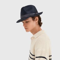 The Federico combines elegance and practicality, making it the perfect hat for sunny days. Made of fine parasisal, which is a special type of straw with a smooth, lustrous surface, this hat guarantees freshness and comfort even on hot days. The embossed delavè hat band, in a 1¼ in (3 cm) width, adds sophistication and detail, accentuating the meticulous design standards that define Borsalino. The medium brim is 2 in (6 cm) wide. The size of this hat is in line with standard measurements, based on the circumference of the head. 100% Made in Italy Elegant Curved Brim Felt Hat For Vacation, Luxury Fedora With Curved Brim In Toquilla Straw, Luxury Toquilla Straw Hat With Short Brim, Luxury Brimmed Fedora In Toquilla Straw, Luxury Toquilla Straw Hat With Curved Brim, Luxury Straw Hat With Flat Brim, Luxury Short Brim Toquilla Straw Panama Hat, Luxury Short Brim Straw Hat For Kentucky Derby, Luxury Toquilla Straw Fedora With Short Brim