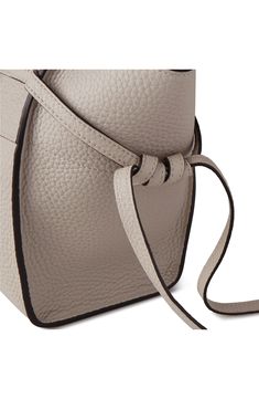 The label's Bayswater silhouette is revamped in a minimalist, hardware-free design with this richly pebbled satchel flanked by the signature Clovelly ties. Front flap closure Shoulder straps Interior wall pocket Lined Leather Imported Designer Handbags Elegant Crossbody Bag With Pebbled Texture, Luxury Top Handle Bag With Pebbled Texture, Elegant Workwear Bag With Pebbled Texture, Elegant Pebbled Texture Work Bags, Workwear Pebbled Leather Satchel With Adjustable Strap, Luxury Business Bags With Pebbled Texture, Elegant Satchel With Adjustable Strap In Pebbled Leather, Elegant Pebbled Leather Satchel With Adjustable Strap, Luxury Workwear Bag With Pebbled Texture