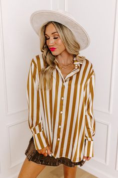 - Go for boss babe vibes with this luxe top! - Unlined material with an ivory hued stripe pattern and a satin finish - A collared neckline - A button-up front - Long sleeves with button closure cuffs and accent slits - A relaxed silhouette that ends in a rounded hemline Black Curves, Stripe Top, Women Clothing Boutique, Boss Babe, Online Womens Clothing, Distressed Jeans, Satin Finish, High Waist Jeans, Stripes Pattern