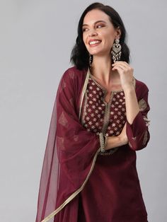 Maroon yoke design kurta with palazzos and dupattaMaroon zari sequinned yoke design straight calf length kurta, has a round neck, three-quarter sleeves, side slitsMaroon solid palazzos, has partially elasticated waistband, slip-on closureMaroon solid dupatta, has zari taping border Kurta Sets For Women, Design Kurta, Yoke Design, Embroidered Kurti, Exotic Women, Cotton Kurta, Kurta Designs, Embroidered Silk, Tiered Dress