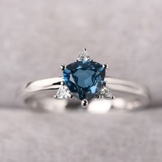 ◆ The ring is handcrafted from sterling silver and decorated with a dazzling 6*6 mm London blue topaz and CZs. It is suitable for engagement/anniversary/daily occasion. ◆ Production Description: Main stone Type: Real London Blue Topaz Main Stone Shape: Trillion Cut Main Stone Size: 6*6 mm(1.02ct) Side stone: CZ Metal: 925 Sterling silver - Other options available in the drop down menu ◆ Customization: √Free for Add Engraving √Other Metal Type Available √Other Gemstones & Shapes Available √Pe Fine Jewelry Topaz Ring With Trillion Cut, Fine Jewelry Trillion Cut Topaz Ring, Fine Jewelry Topaz Ring With Trillion Cut Gemstone, Blue Trillion Cut Sterling Silver Ring, Blue Topaz Trillion Cut Ring, Blue Trillion-cut Topaz Ring, Blue Trillion Cut Topaz Ring, Dazzling Topaz Promise Ring, Blue Trillion Cut Topaz Ring With Accent Stones