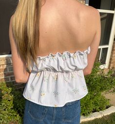 Get ready to turn heads in The Amelia Top! Made with love from 100% thrifted materials, this scrunch tube top features a playful mix of dainty pinstripes and floral bouquets. With an elasticized design, it's easily adjustable for a perfect fit. Size Guide: Size 4: Bust 33-36, Waist 27-30 Size 10: Bust 36-40, Waist 30-34 Spring Tube Top With Smocked Back, Spring Cotton Tube Top With Smocked Back, Stretch Tube Top For Spring And Summer, Fitted Tube Top With Smocked Back For Day Out, Spring Stretch Tube Top With Smocked Bodice, Spring Cotton Stretch Tube Top, Sleeveless Tube Top With Smocked Back For Spring, Strapless Spring Tops With Smocked Bodice, Strapless Tops For Spring And Summer