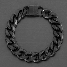 This High Polished Curb Chain Bracelet Has A Solid Stainless Steel Curb Link Chain Construction. The Solid Metal Construction Gives This Item A Nice Weight For The Perfect Feel And Appeal. The Bracelet Construction Yields Maximum Comfort, As The Links Contour Well On To The Shape Of Your Wrist. This Bracelet Measures 8 1/2 Inches Long X 9/16 Inches Wide And Secures With A Lobster Claw Clasp. In: Stainless Steel Black Curb Chain Bracelet Black Metal Chain Bracelet For Gift, Black Metal Chain Bracelet As A Gift, Black Chain Link Bracelet Gift, Gift Black Metal Chain Bracelet, Formal Black Bracelet With Adjustable Chain, Modern Black Metal Bracelets, Modern Black Metal Chain Bracelet, Black Metal Cuban Link Bracelet As A Gift, Minimalist Black Metal Chain Bracelet