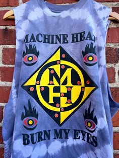 Description: Show off your vintage style with our 1994 Vintage Machine Head Burn My Eyes Tank! Made from high-quality materials, this tank features a cool and attractive graphic that will make you stand out. Perfect for music fans and fashion enthusiasts alike. Available in size XL. Material: 100% Cotton Size: XL Length: 28.5” Chest: 46” Label: unbranded sold as is for sleeves cut Condition: This item is pre-loved Vintage Machine, Machine Head, Music Fans, Pitcairn Islands, British Indian Ocean Territory, Papua New Guinea, My Eyes, Tanzania, Caribbean Netherlands