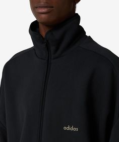 Founded in the 1940s, adidas has become a global leader in sportswear, known for its innovative designs and commitment to performance.This adidas Track Jacket x Fear of God Athletics in black is a standout piece from the Fall/Winter 2024 collection. The collaboration with Fear of God brings a unique edge to this sporty jacket, perfect for adding a touch of style to your athletic wardrobe. Don't miss out on this exclusive piece, available now at SVD. Sporty Jacket, Adidas Track Jacket, Brand Collaboration, Fall Winter 2024, Adidas Track, Fear Of God, Bank Card, Unique Aesthetic, Winter 2024