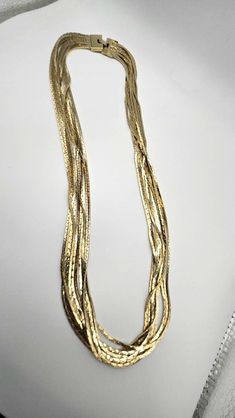 Long and dramatic multi goldtone chain necklace, very 70's. It is heavy and well made, unsigned but could be a designer piece. Excellent condition, looks practically brand new. Gold Multi-strand Necklace For Evening, Gold Long Chain Necklace For Evening, Gold Long Necklace For Evening, Gold Multi-strand Chain Necklace For Formal Events, Gold Multi-strand Chain Necklace For Formal Occasions, Vintage Gold Multi-strand Chain Necklace, Wedding Necklaces, Chandler Az, Wedding Jewellery Necklace