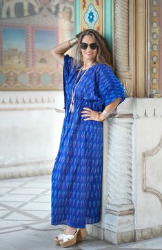 Our Brindisi Blue mercerized cotton maxi kaftan dress is the perfect BLUE dress! This amazing fabric is hand woven with a combination of very fine cotton yarns that create its incredibly vibrant, and piercingly beautiful colour! You can wear this maxi dress anywhere you want to brighten people's days! It is guaranteed to make everyone smile, mostly she who wears it. It is luxurious, comfortable, bright, and inimitable! Pax Philomena is proud to be supporting the artisans in India who still weave Traditional Blue Floor-length Maxi Dress, Blue Floor-length Beachwear Dress, Floor-length Blue Beachwear Dress, Bohemian Blue Floor-length Kurta, Blue Cotton Floor-length Maxi Dress, Blue Cotton Maxi Dress Floor-length, Vacation Ikat Print Maxi Dress, Blue Bohemian Maxi Dress, Blue Floor-length Maxi Dress For Festival