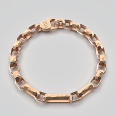 Designed and crafted with timeless elegance in the heart of Italy, this men's bracelet is a masterpiece of artisanal craftsmanship. Each link of the bracelet is forged from the finest 14k or 18k gold, meticulously faceted and hammered to create a unique texture that reflects the light with a captivating brilliance. The hammered effect, a hallmark of Italian craftsmanship, gives the bracelet a rugged yet refined appearance, blending tradition with modern sophistication. Material : 14k or 18k Gold Gold Bracelets For Men Unique, Neutral Jewelry, Mens Bracelet Silver, Jeweled Earrings, Gold Armband, Mens Gold Bracelets, Italian Craftsmanship, Italian Jewelry, Gold Bracelets