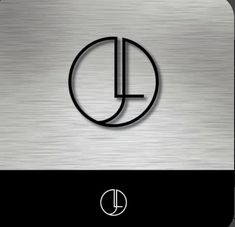 the letter j is inscribed in a circle on a metal background with black and white accents