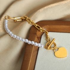 Style: Female Material: Titanium Steel, Shell Bead Pearl Pearl Type: Cultured Pearl Color: White Pearl Shape: Irregular Bracelet Length: 20cm Heart Charm Height: 1.6cm Bracelet With Heart, Pearl Types, Shell Beads, Pearl Color, Pearl Ring, White Pearl, Cultured Pearls, Pearl Pendant, Pearl Bracelet