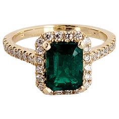 Columbian (Diffused) Emerald Cut Emerald 1.90 carats in total. White Diamond 0.85 carats in total, G color and VS clarity. size 7. Retail Price $3500. Type: Artisan Color: Green, Yellow Stone cut: Emerald Cut Stone: Emerald Item size: 7 Item type: Vintage Material: 14K Gold, Yellow Gold Retail Price: $3500 Emerald Cut Emerald Ring, Total White, Vintage Material, Yellow Stone, Stone Cuts, Emerald Ring, Jewelry Rings Engagement, White Ring, Gold Yellow