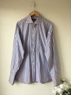 Men's Burberry London Button Down Shirt High quality, awesome shirt! Features: long sleeve, button down, front pocket, striped, amazing fabric! Material: 100% imported cotton Size: 16.5 Color: white with shades of blue and pink stripes This is a pre-owned shirt in good condition . The cuffs have been layered to stiffen so they are a shade different. Please zoom all photos Wonderful colors and super stylish! Summer Linen Shirt, Vintage Striped Dress, Mens White Dress Shirt, Plaid Dress Vintage, Pink Striped Shirt, White Linen Blouse, Formal Shirt Dress, Burberry Shirt, Mens Dress Shirts