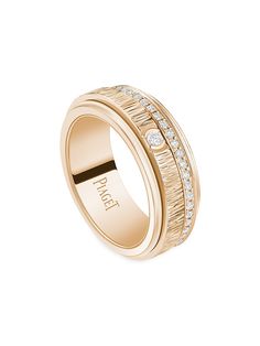 a gold ring with diamonds on it