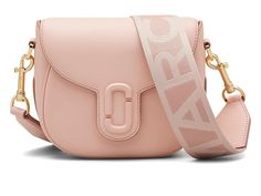 Marc Jacobs The Saddle Bag - Cross Body Handbags : Rose : Viet Nam The Saddle Bag Refresh your stylish look carrying the Marc Jacobs The Saddle Bag. Crafted from leather, this bag features magnetic closure, detachable and adjustable crossbody strap, and one zippered interior pocket. Brand logo on the front. Polyester lining. Imported. Saddle Bag, Crossbody Strap, Magnetic Closure, Saddle Bags, Cross Body Handbags, Saddle, Marc Jacobs, Cross Body, Brand Logo