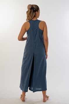 Find the perfect blend of comfort and style with our racing back summer jumpsuit. This model is designed to give you a flawless look and impress with its uniqueness. The jumpsuit is designed with practicality in mind, offering you hidden side pockets where you can store your essential small items. Its calf-length length gives your look an ephemeral lightness and grace. The scoop neckline and cut-out back add an extra dose of sophistication to your outfit. The front panel adds a touch of luxury, Beach Ramie Linen Dress, Solid Linen Dress For Vacation, Unlined A-line Linen Dress, Lagenlook Linen Beach Dress, Fitted Linen Lagenlook Dress, Flax Color Ramie Beach Dress, Beach Dress In Flax Ramie, Beach Dress In Flax Color Made Of Ramie, Beige Sleeveless Cotton Dress