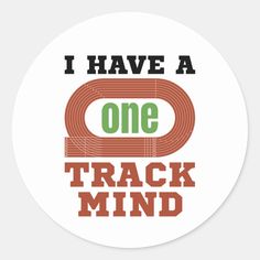 i have a one track mind sticker on a white round background with the words, i