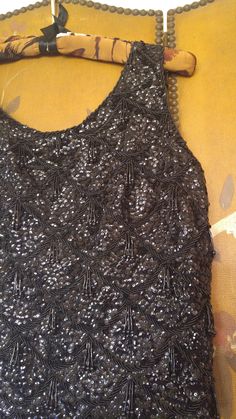 "Stunning 60's black beaded and sequin top. Heavily hand decorated with black sequins and beads. Hem has fringing of little black beads and round beads on the ends. Zip up the back. Lined bust 36\", length 22\"" Gold Dragon, Dragon Print, Cute Notes, Decorative Trim, Pink Suede, Sequin Top, Black Sequins, Hand Decorated, Embroidery Flowers