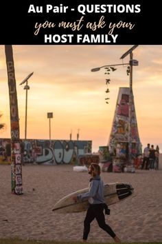 a person walking on the beach with a surfboard in their hand and text that reads, au pair - questions you must ask your host family