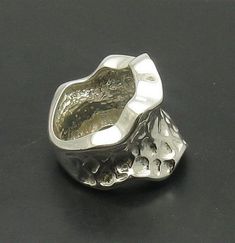 Sterling silver ring 925/1000. Stamped 925.Approximate weight 14.5 grams. Top width 2.3 cm (0.92 inches). All our jewels are made from solid sterling silver 925/1000 and are carefully crafted by hand in our family workshop. We dispatch your orders in 5 working days, worldwide and the postage is $5. We ship registered priority mail. Please allow 5-7 working days for delivery in Europe and 10-15 working days outside Europe. For any questions - please do not hesitate to contact me! Silver Wide Band Hand Cast Ring, Silver Wide Band Ring Hand Cast, Collectible Sterling Silver Ring With Wide Band, Formal Sterling Silver Wide Band Ring, Sterling Silver White Gold Skull Open Ring, White Gold Sterling Silver Skull Open Ring, White Gold Polished Skull Ring Gift, White Gold Skull Ring With Polished Finish Gift, White Gold Skull Ring With Polished Finish