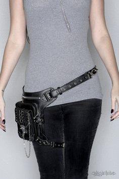 The original Blaster 3.0 Bag - one of our many iconic holster bags - many have imitated, none have duplicated. Can be worn several ways: 1. Around your waist like a belt bag-fanny pack combo. 2. Under your arm, like a shoulder holster. 3. Extend the straps for a shoulder bag. 4. For extra security on the shoulder bag option, you can then use another strap to attach it to your thigh ( great theft deterrent ) 5. Backpack 6. Motorcycle Bag A video of this bag in action can be found here: https://youtu.be/-SwPlLNWVo0 Our standard main strap allows this bag to be worn up to a 45" waist circumference and has many options for adjustments. DIMENSIONS: the big pocket is: 6.5" tall x 5.5" wide x 1.5" depth the front pocket is: 5" tall x 4.5" wide x 1.75" depth flat zipper pocket is: 8" tall x 4.5" w Shoulder Holster, Fanny Pack Purse, Holster Bag, Motorcycle Bag, Leg Bag, Big Pocket, Pocket Belt, Hooded Shirt, Waist Circumference